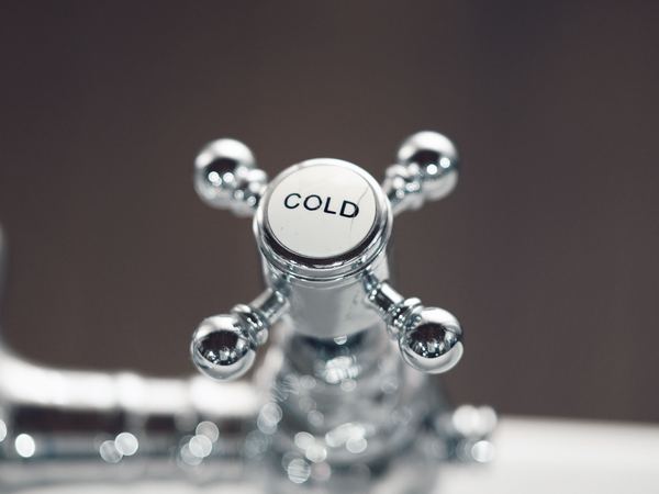 Chrome bathroom tap with cold handle